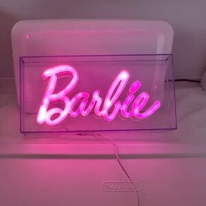 A Barbie electric plug-in light highlighted in bright pink great night light😊!!